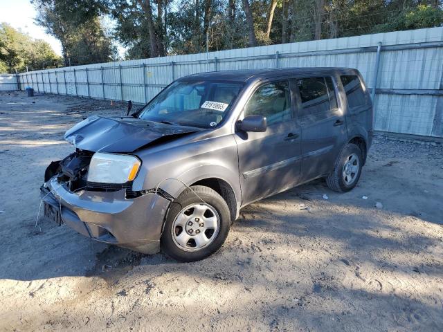 HONDA PILOT LX 2014 with VIN 5FNYF3H21EB026060 - Photo from auction