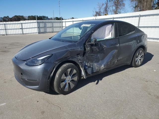 TESLA MODEL Y 2023 with VIN 7SAYGDEE3PA158497 - Photo from auction