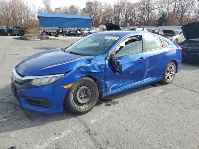 HONDA CIVIC LX 2017 z numerem VIN 19XFC2F53HE045792 - Zdjęcie z aukcji