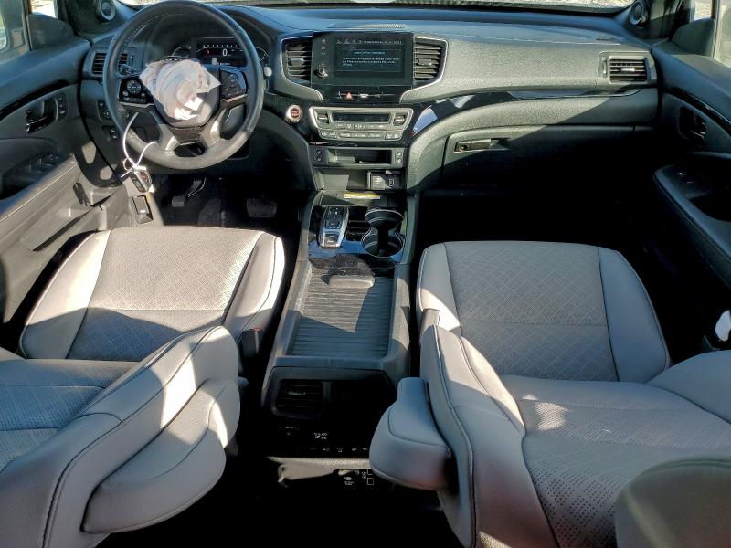 Photo 8 from auction – 2023 HONDA PASSPORT E with VIN 5FNYF8H09PB012549