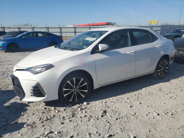 TOYOTA COROLLA L 2017 with VIN 5YFBURHE7HP623232 - Photo from auction