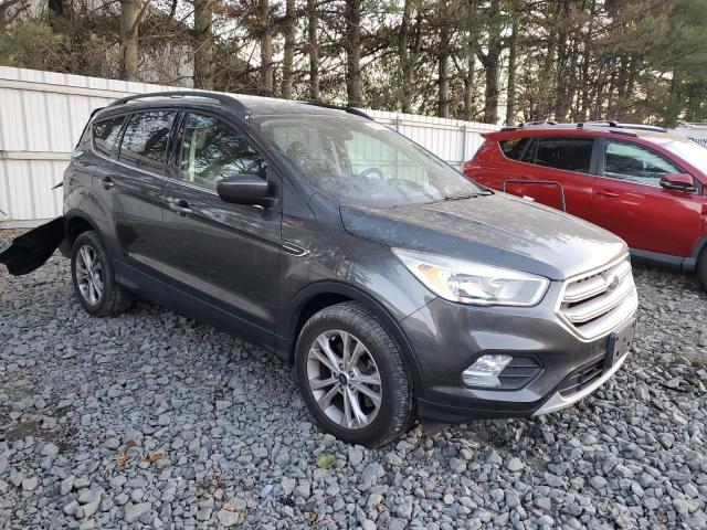 Photo 4 from auction – 2018 FORD ESCAPE SE with VIN 1FMCU9GD4JUD46797
