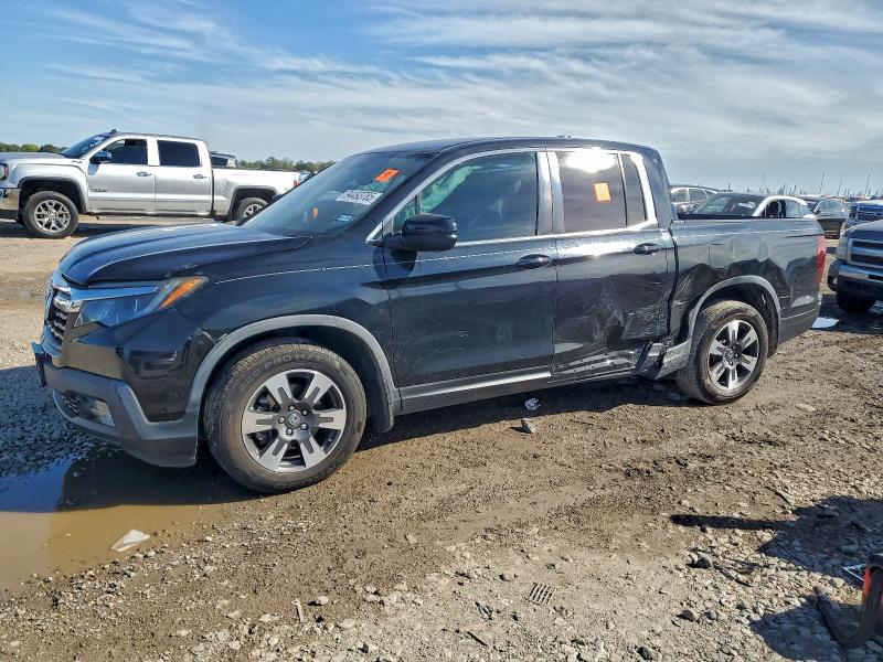 HONDA RIDGELINE 2017 with VIN 5FPYK2F66HB010458 - Photo from auction