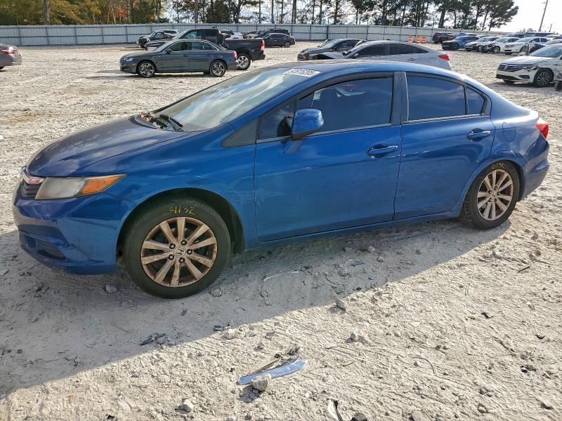 HONDA CIVIC EXL 2012 with VIN 2HGFB2F90CH546692 - Photo from auction