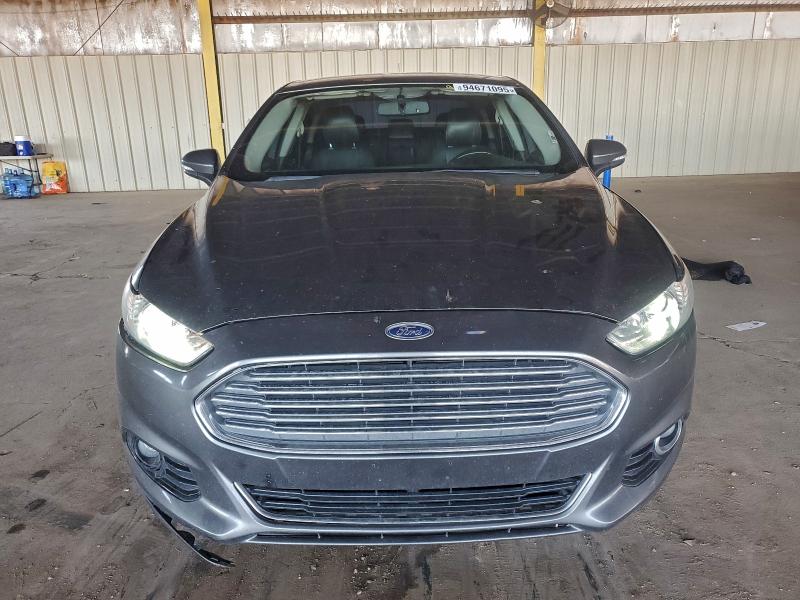 Photo 5 from auction – 2016 FORD FUSION TIT with VIN 3FA6P0K97GR174732