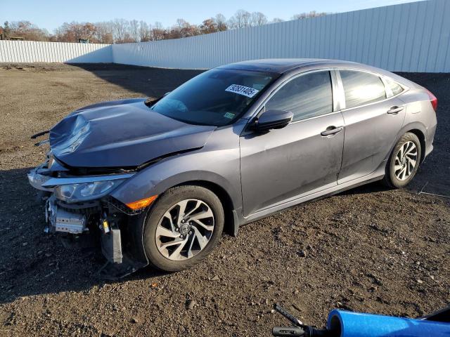 HONDA CIVIC EX 2016 with VIN 19XFC2F83GE216033 - Photo from auction