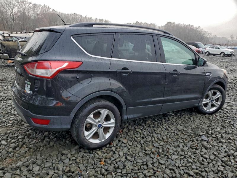 Photo 3 from auction – 2015 FORD ESCAPE SE with VIN 1FMCU0GXXFUA48381