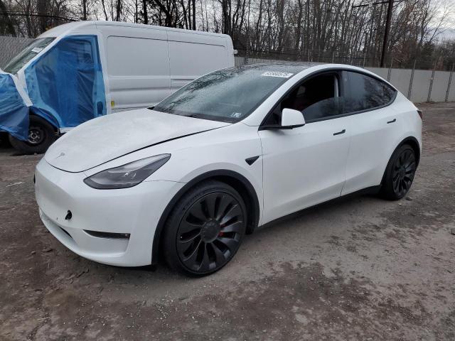 TESLA MODEL Y 2022 with VIN 7SAYGDEF0NF309384 - Photo from auction