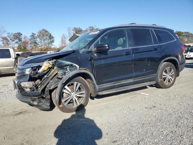 HONDA PILOT EXL 2016 with VIN 5FNYF5H85GB009796 - Photo from auction