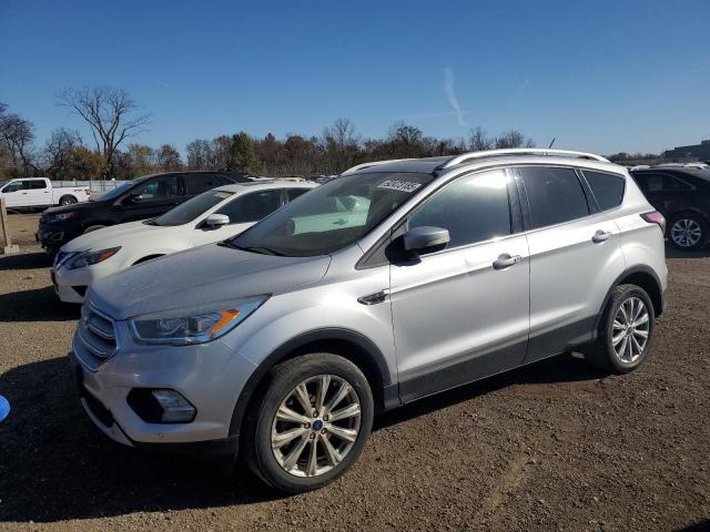 Photo 1 from auction – 2018 FORD ESCAPE with VIN 1FMCU9J9XJUA18627