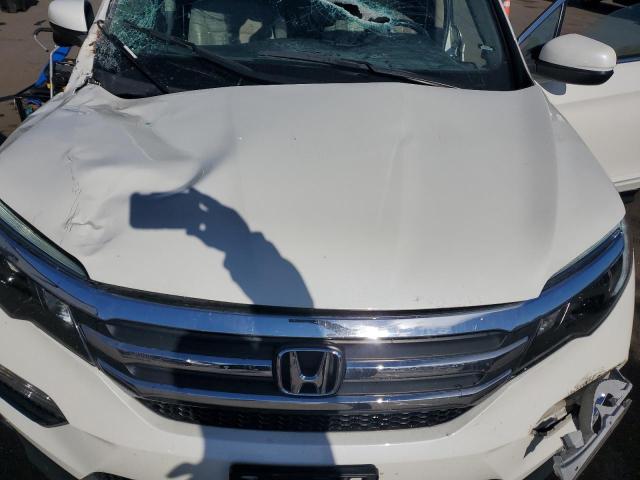 Photo 12 from auction – 2018 HONDA PILOT EXLN with VIN 5FNYF6H70JB031287