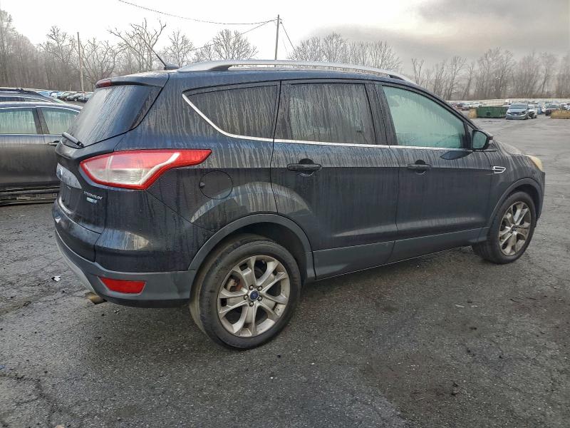 Photo 3 from auction – 2014 FORD ESCAPE TIT with VIN 1FMCU9J92EUB21563