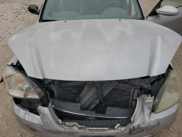 Photo 11 from auction – 2003 NISSAN ALTIMA BAS with VIN 1N4AL11D53C129167
