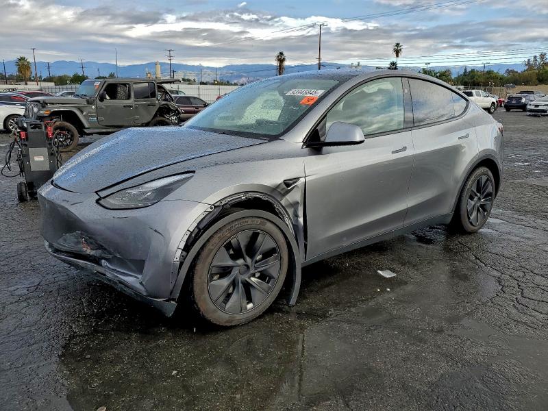 TESLA MODEL Y 2025 con VIN 7SAYGDED4SF275802 - Foto de la subasta