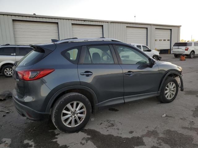 Photo 3 from auction – 2013 MAZDA CX-5 SPORT with VIN JM3KE2BEXD0142352