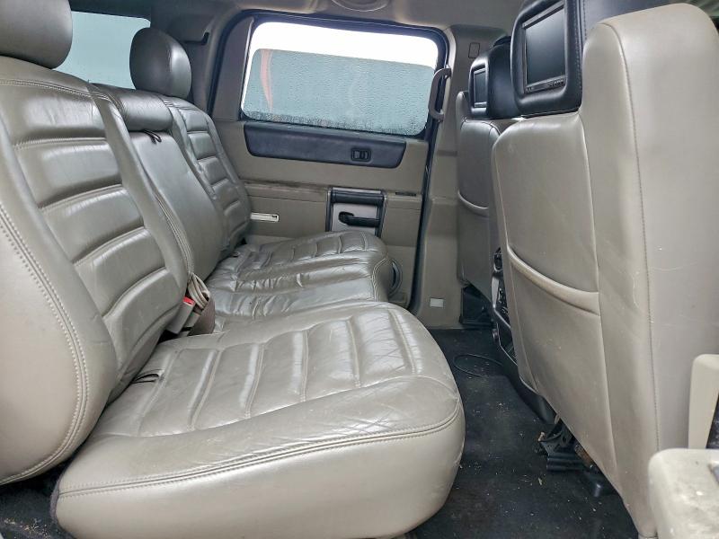 Фото 11 с аукциона – 2003 HUMMER H2 с VIN 5GRGN23U53H113795