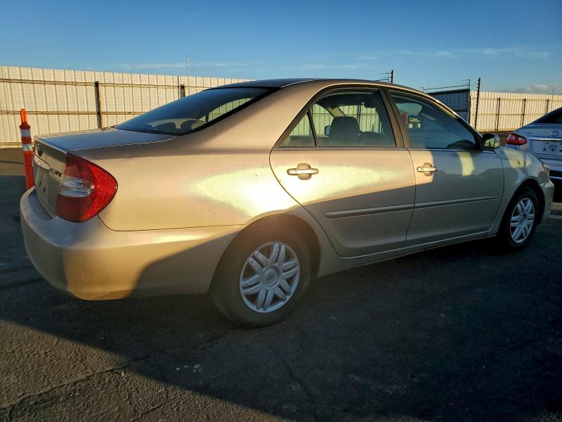 Photo 3 from auction – 2002 TOYOTA CAMRY LE with VIN JTDBE32KX20125262