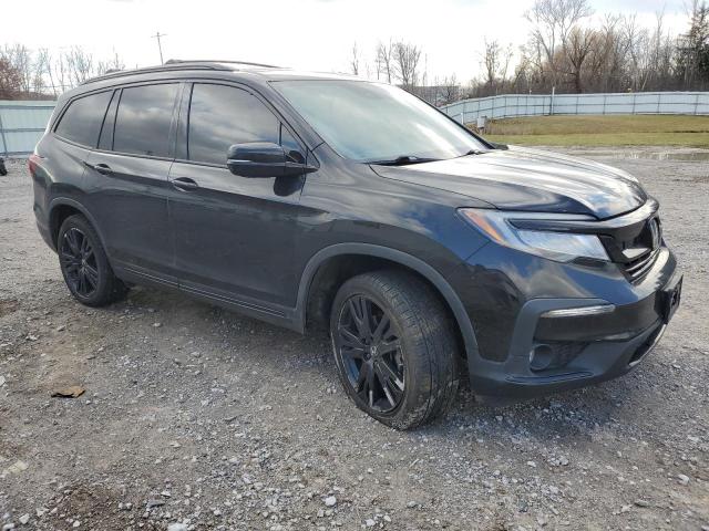 Photo 4 from auction – 2021 HONDA PILOT BLAC with VIN 5FNYF6H74MB012620