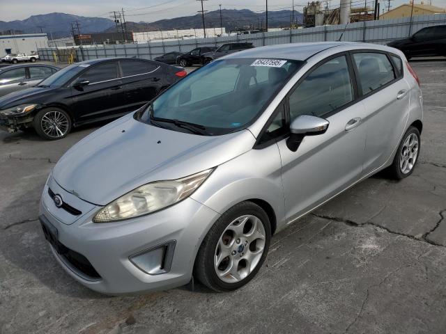 FORD FIESTA SES 2011 with VIN 3FADP4FJ8BM107002 - Photo from auction
