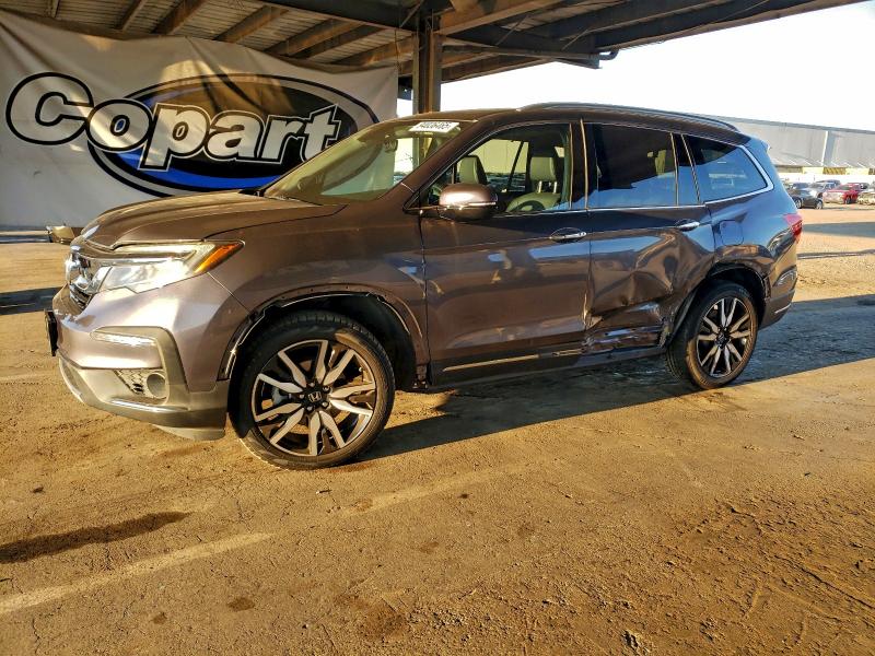 HONDA PILOT TOUR 2021 with VIN 5FNYF6H66MB005790 - Photo from auction