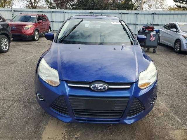 Foto 5 de la subasta – 2012 FORD FOCUS SE con VIN 1FAHP3K25CL354314