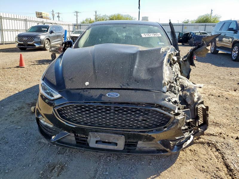 Photo 5 from auction – 2017 FORD FUSION SPO with VIN 3FA6P0VP2HR214047