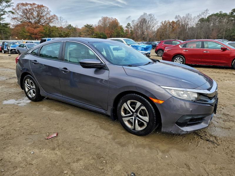 Photo 4 from auction – 2016 HONDA CIVIC LX with VIN 2HGFC2F51GH565185