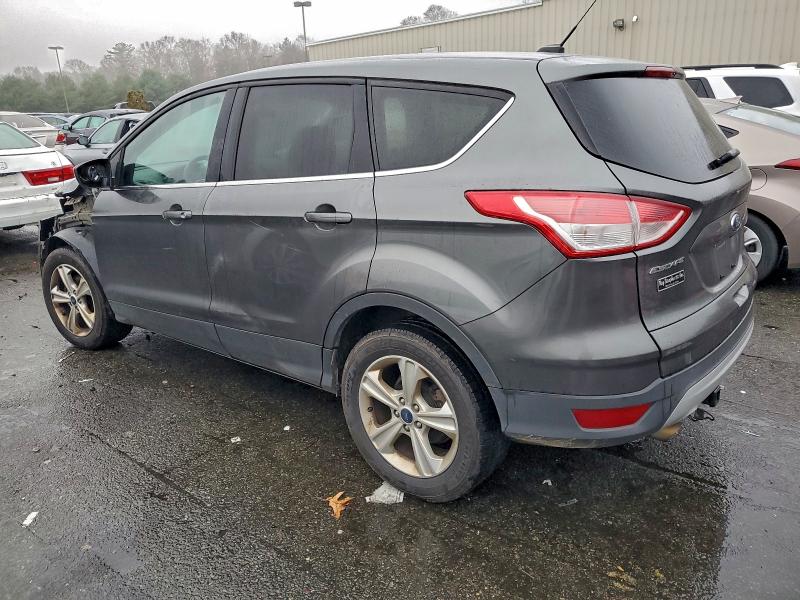 Photo 2 from auction – 2016 FORD ESCAPE SE with VIN 1FMCU9GX9GUB84880