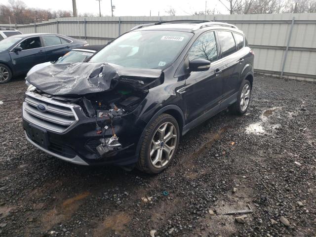 FORD ESCAPE TIT 2017 with VIN 1FMCU9J99HUC30526 - Photo from auction