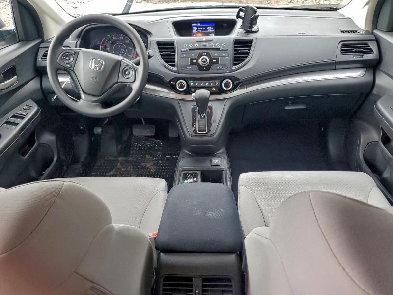 Photo 8 from auction – 2015 HONDA CR-V LX with VIN 5J6RM4H34FL095147