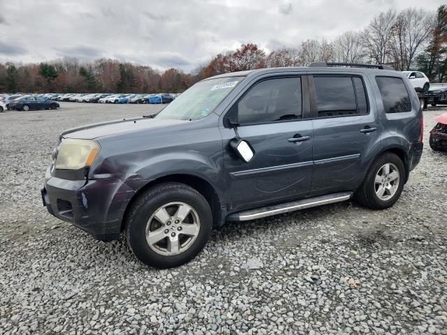 HONDA PILOT EX 2011 with VIN 5FNYF4H4XBB094019 - Photo from auction