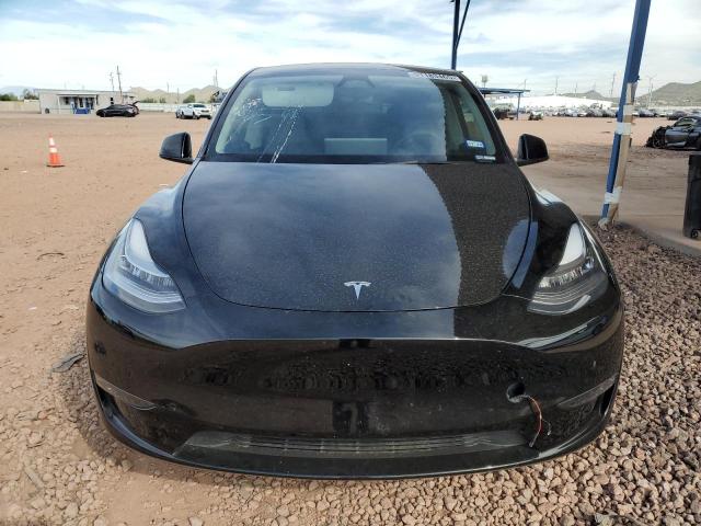 Photo 5 from auction – 2023 TESLA MODEL Y with VIN 7SAYGDEE2PA136751