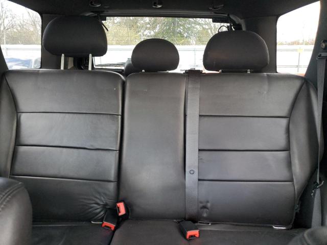 Photo 10 from auction – 2010 FORD ESCAPE LIM with VIN 1FMCU9E77AKB20715