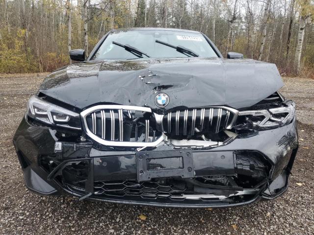 Photo 5 from auction – 2025 BMW 330XI with VIN 3MW89CW0XS8F73656