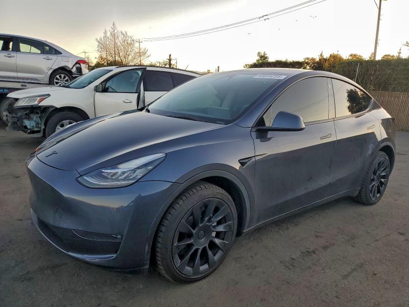TESLA MODEL Y 2023 with VIN 7SAYGDEE7PA107746 - Photo from auction