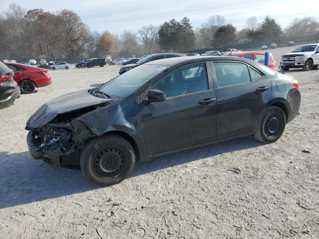 TOYOTA COROLLA L 2016 with VIN 5YFBURHE9GP428120 - Photo from auction