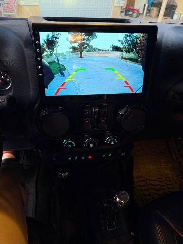 Photo 14 from auction – 2014 JEEP WRANGLER U with VIN 1C4BJWEGXEL254044
