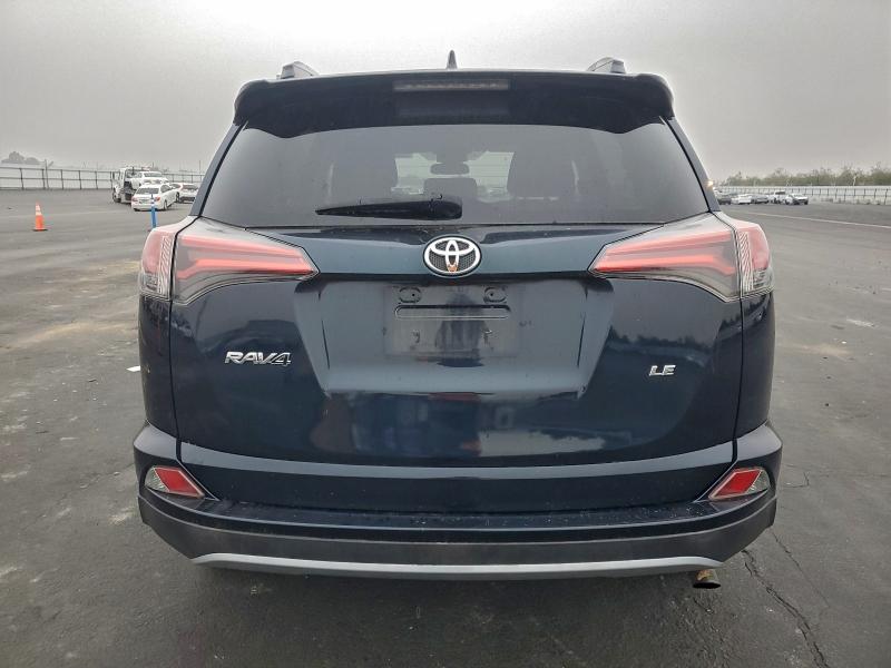 Photo 6 from auction – 2017 TOYOTA RAV4 LE with VIN 2T3ZFREV8HW341023
