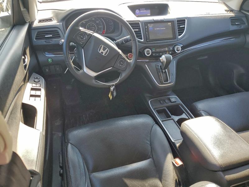 Photo 8 from auction – 2016 HONDA CR-V EXL with VIN 2HKRM4H77GH654754
