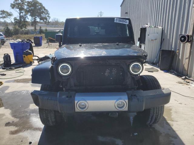 Photo 5 from auction – 2015 JEEP WRANGLER U with VIN 1C4BJWEG3FL564778