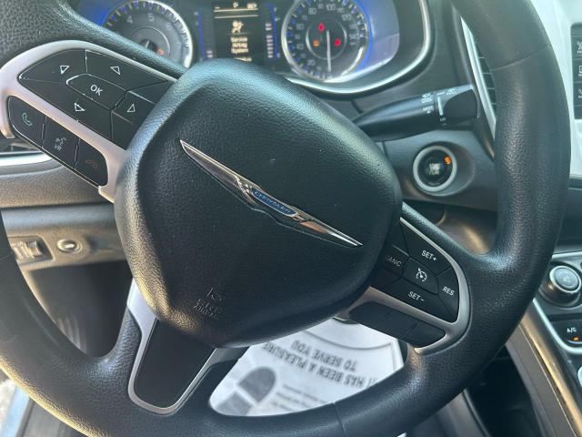 Photo 12 from auction – 2015 CHRYSLER 200 LIMITE with VIN 1C3CCCAB2FN697869