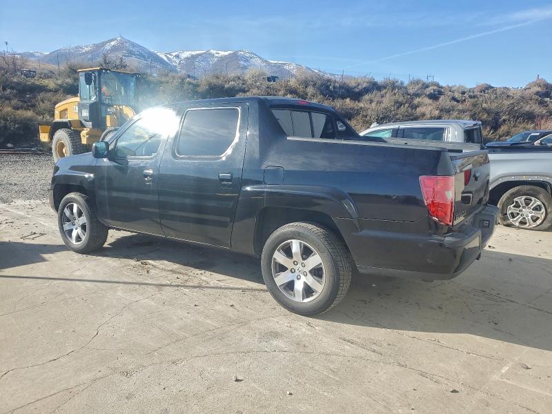 Photo 2 from auction – 2011 HONDA RIDGELINE with VIN 5FPYK1F52BB003810