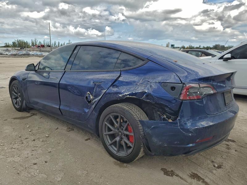 Photo 2 from auction – 2022 TESLA MODEL 3 with VIN 5YJ3E1EB5NF104927