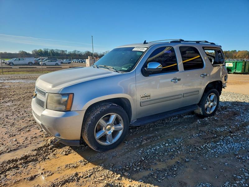 CHEVROLET TAHOE C150 2011 with VIN 1GNSCAE06BR352763 - Photo from auction