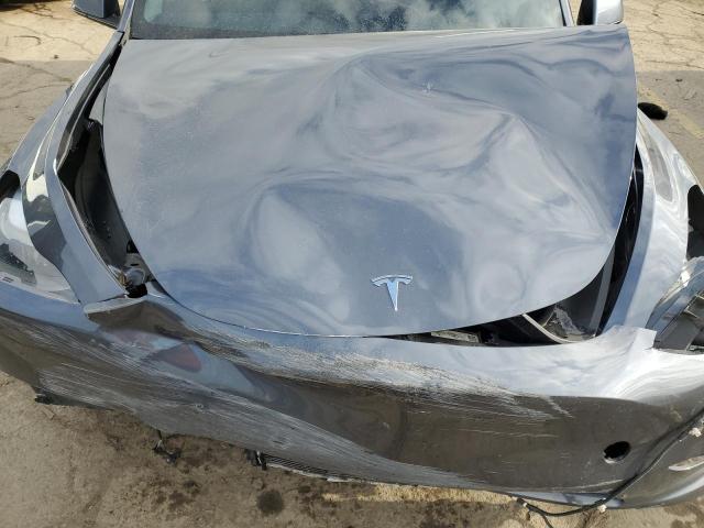Photo 12 from auction – 2023 TESLA MODEL Y with VIN 7SAYGAEE6PF966151