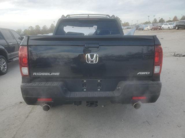 Photo 6 from auction – 2023 HONDA RIDGELINE with VIN 5FPYK3F74PB032049