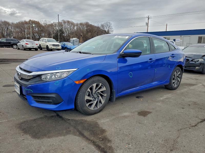 Photo 1 from auction – 2018 HONDA CIVIC EX with VIN 19XFC2F70JE039519