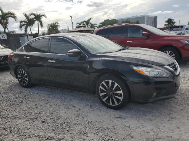 Photo 4 from auction – 2018 NISSAN ALTIMA 2.5 with VIN 1N4AL3AP3JC121667