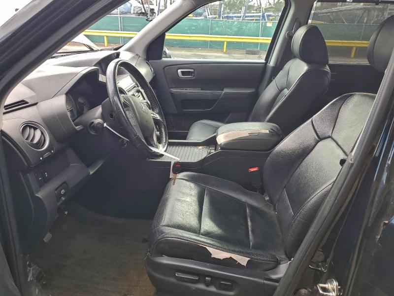 Photo 7 from auction – 2014 HONDA PILOT TOUR with VIN 5FNYF3H90EB008209