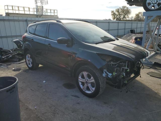 Photo 4 from auction – 2015 FORD ESCAPE SE with VIN 1FMCU9G90FUC66559